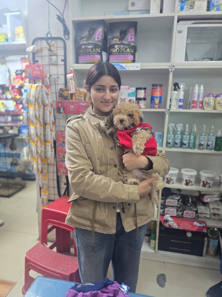 Happy family with their new pet from VS Pet Shop Noida