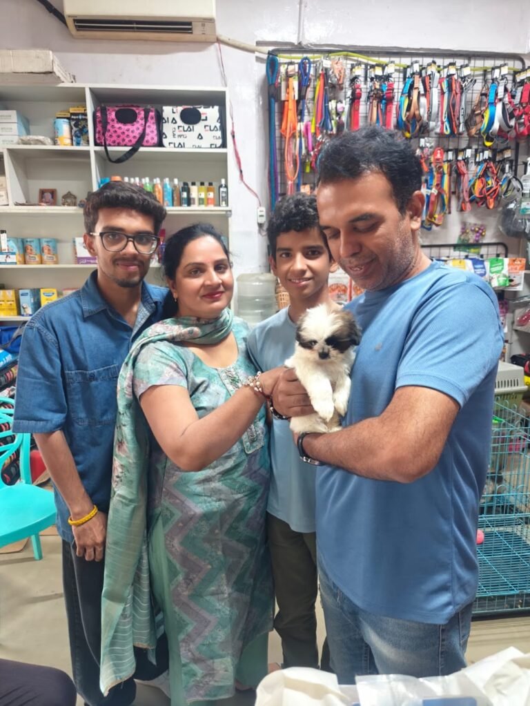 Happy family with their new pet from VS Pet Shop Noida