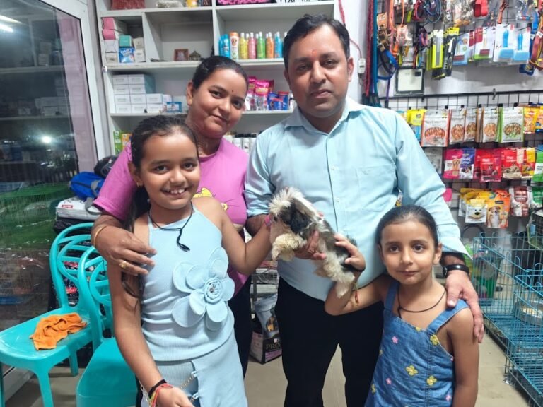 Happy family with their new pet from VS Pet Shop Noida