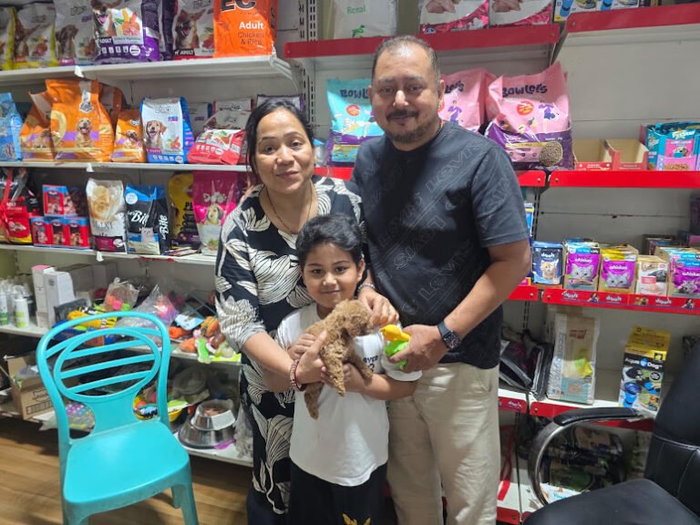 Happy family with their new pet from VS Pet Shop Noida